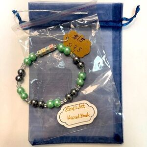 Hand crafted beaded “life” bracelet.